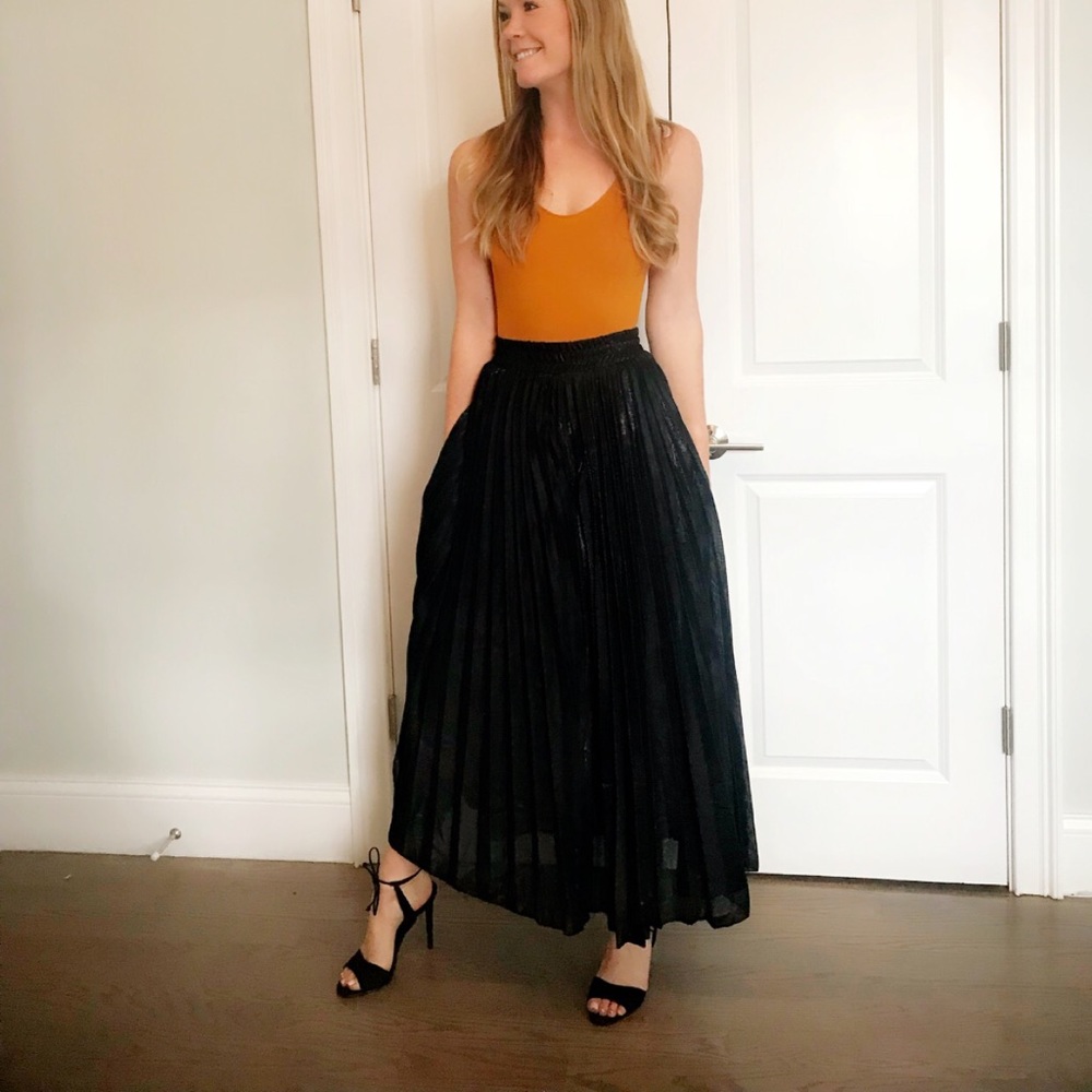 Long black pleated skirt